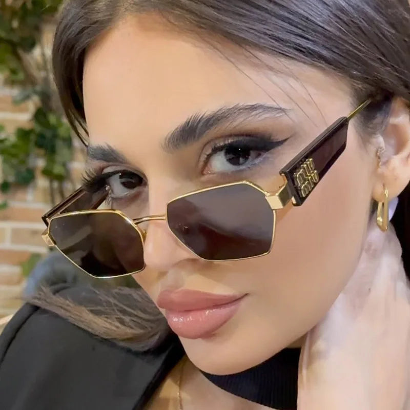 MIU MIU | Black/Gold Sunglasses