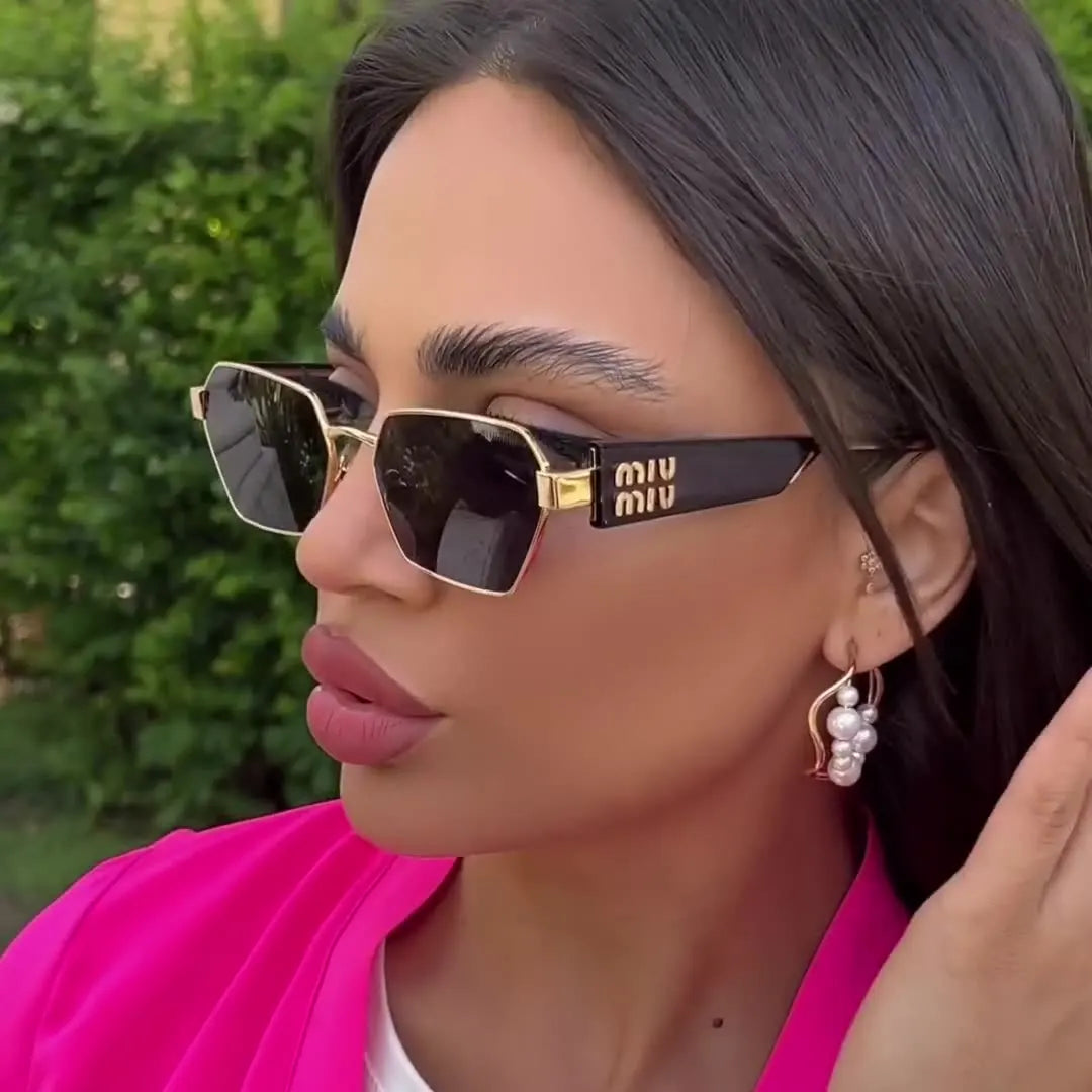 MIU MIU | Black/Gold Sunglasses