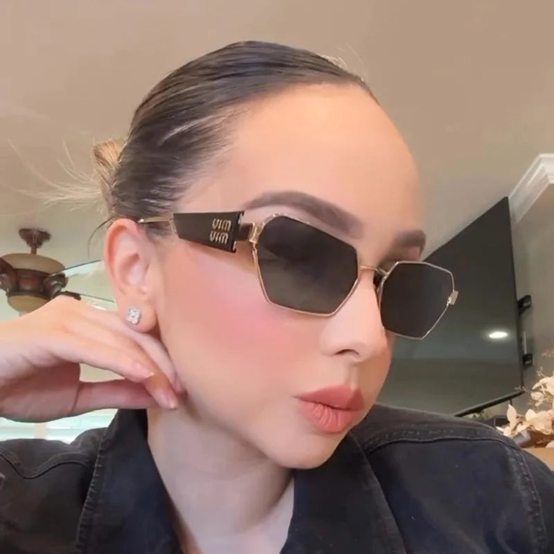 MIU MIU | Black/Gold Sunglasses